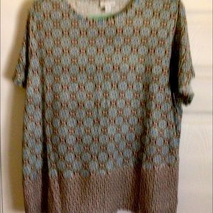 COPY - Blue and brown geometric design blouse with short sleeves.